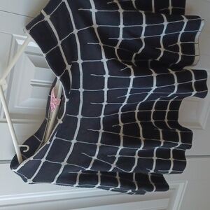 Candies mini skirt. Black with white lines running through it.